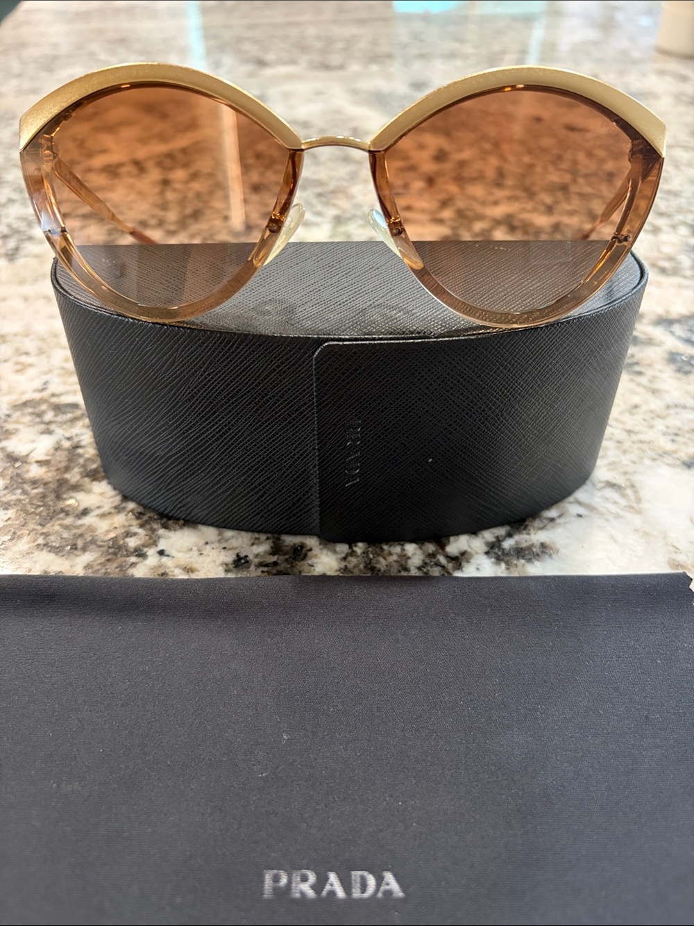 PRADA
Goldtone Acetate Cat Eye Sunglasses SPR07U